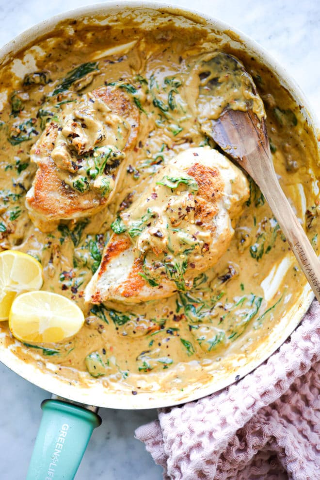 creamy tuscan chicken in a pan