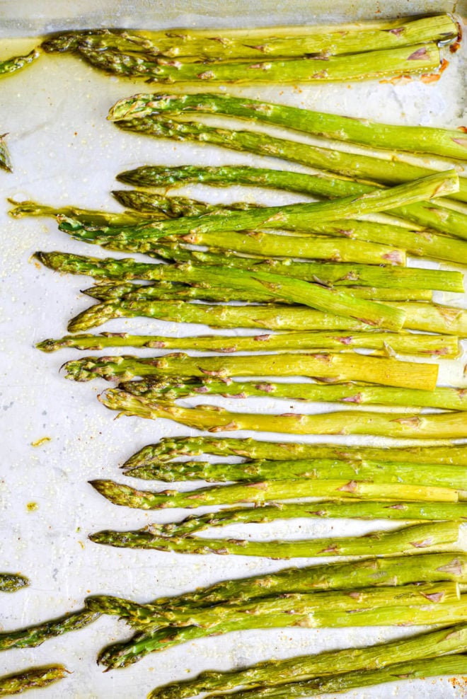 Cooked asparagus on sheet pan