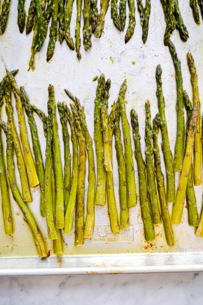 Cooked asparagus on sheet pan