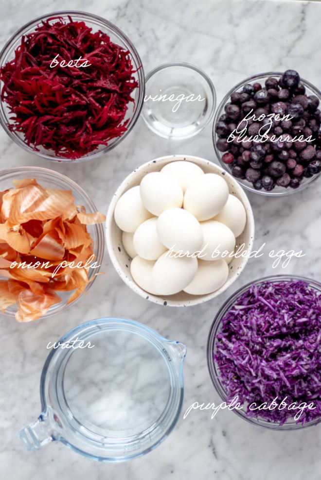 Natural egg dye ingredients with ingredient labels written out in white, cursive letters.