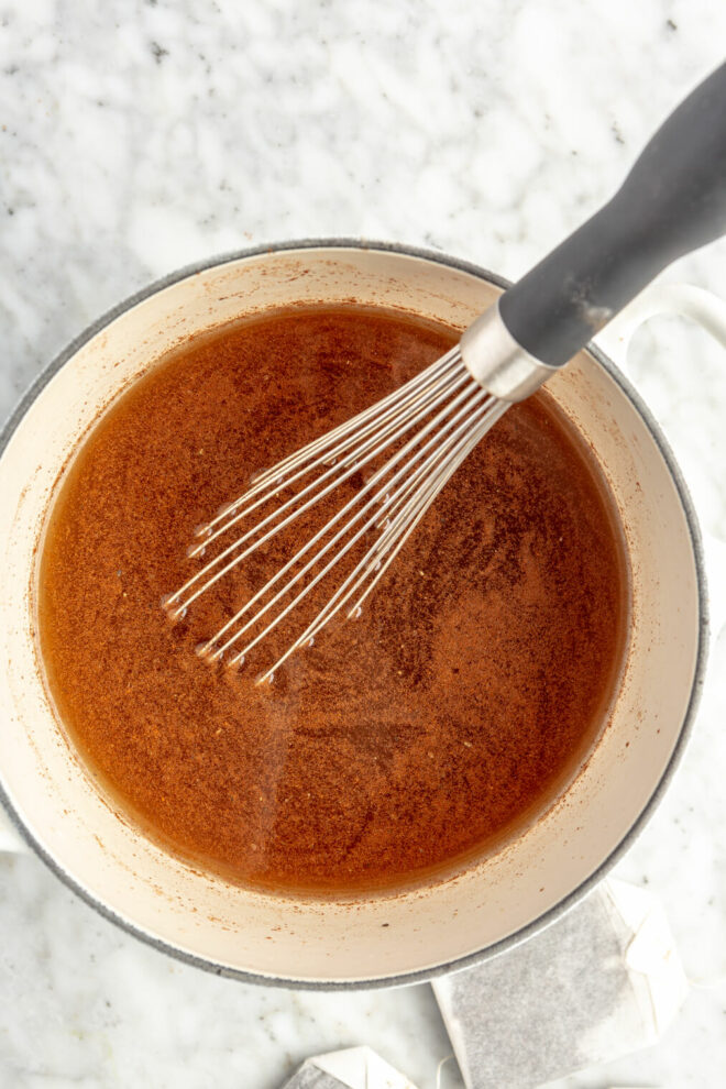 Whisk in a pot with spices and water.