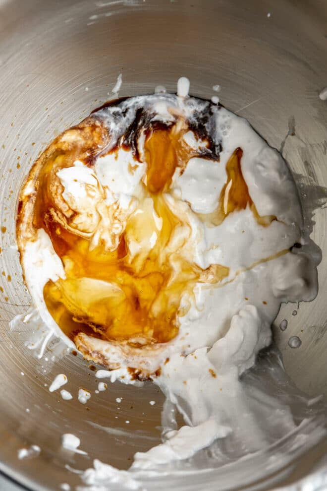 Coconut whipped cream ingredients in a large mixing bowl.