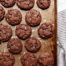 Chocolate brownie cookies on a baking sheet.