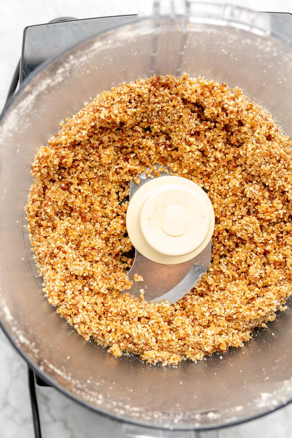 Cashews and dates ground in a food processor.