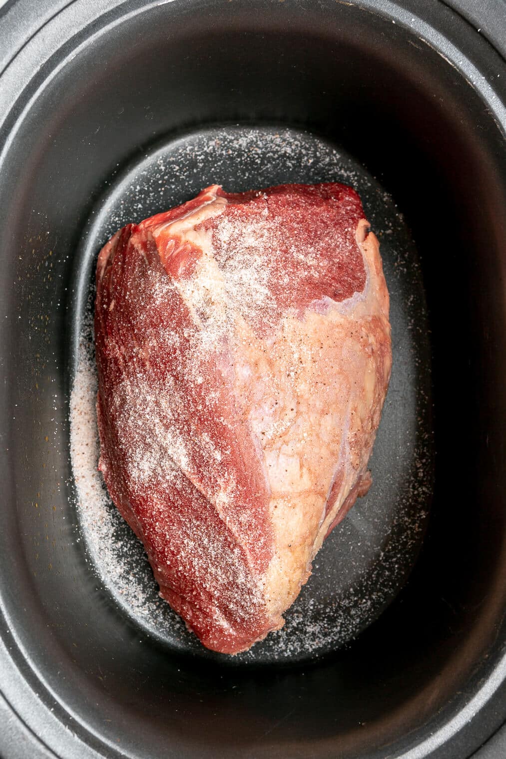 Beef roast in a crockpot.
