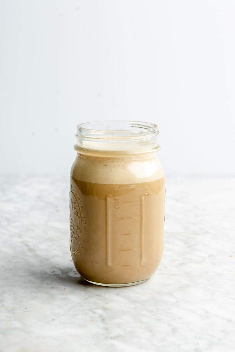 Mushroom coffee that has been frotherd in a mason jar.