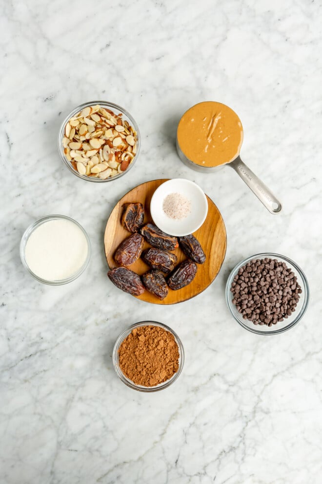 All of the ingredients needed for chocolate date balls.