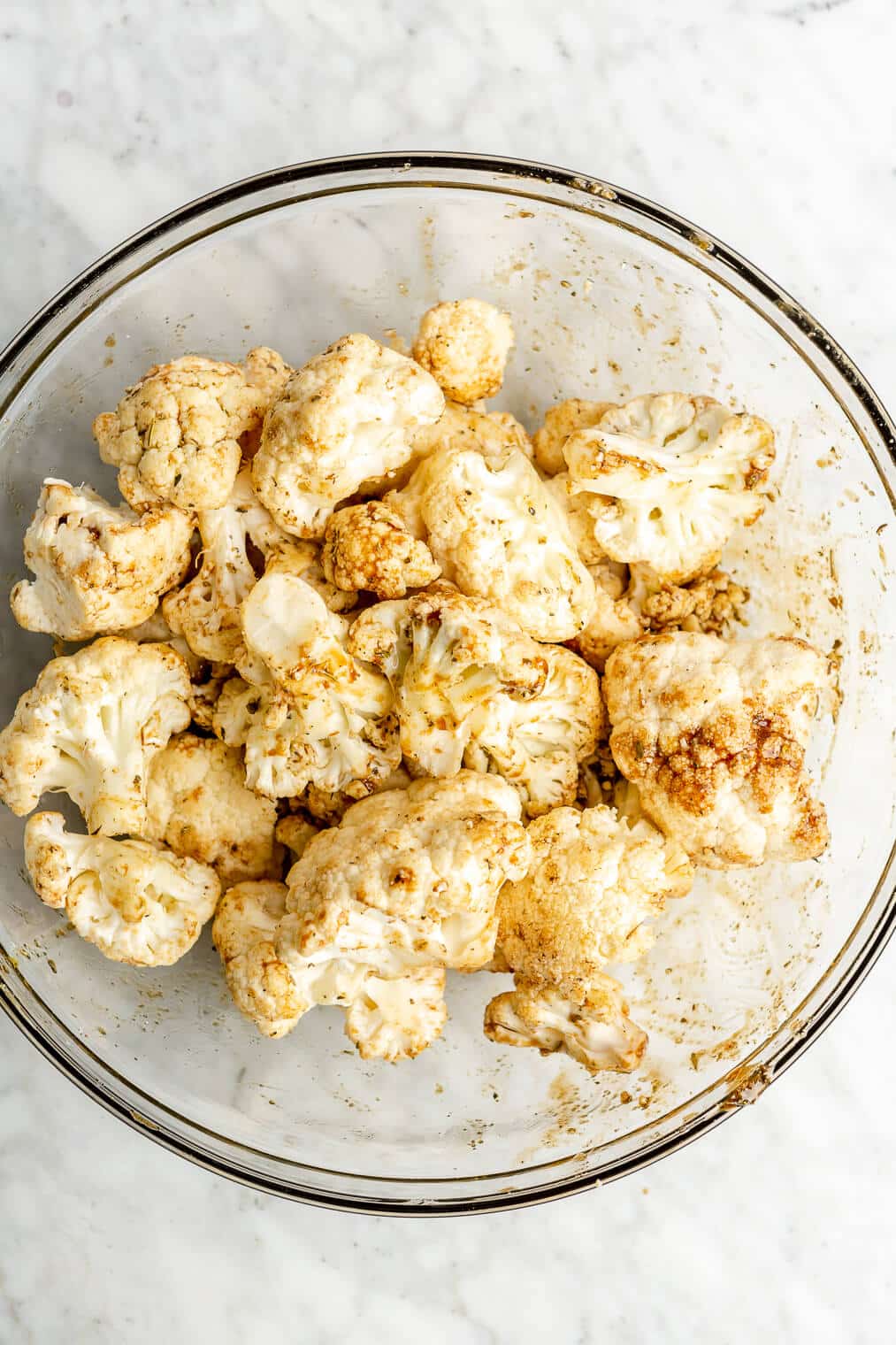 Raw cauliflower florets tossed with a balsamic marinade.