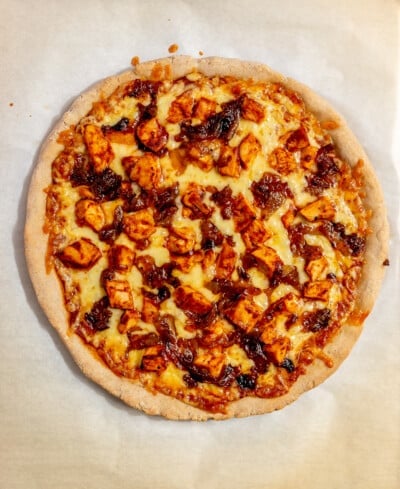 A cooked BBQ chicken pizza before being garnished.
