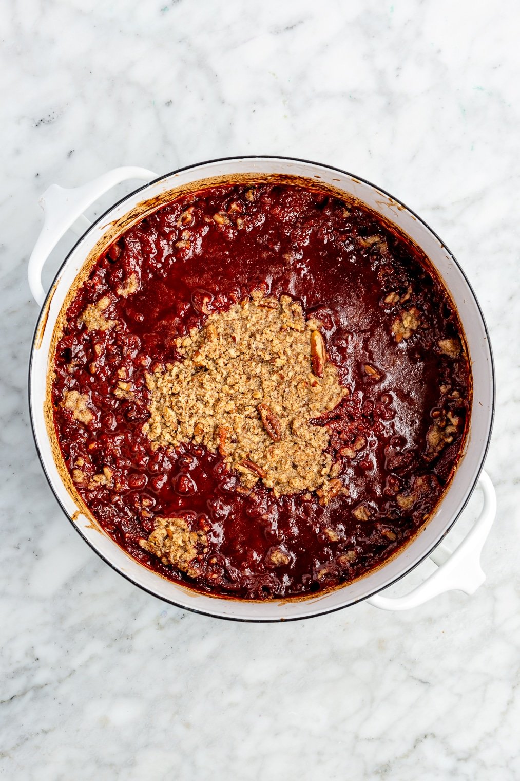 A large dish of strawberry rhubarb crisp.