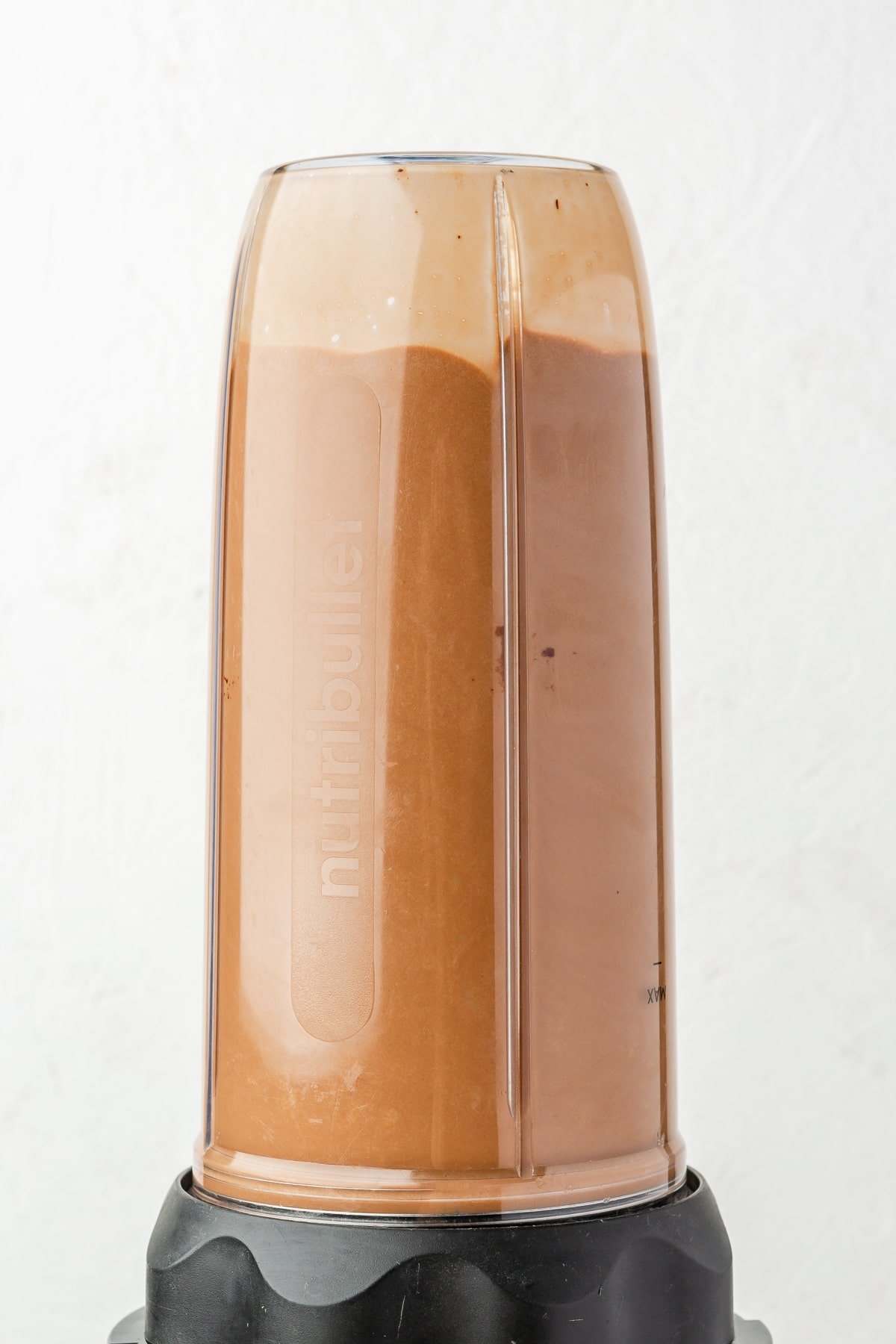 Cocoa powder and gelatin blended in a Nutribullet style individual blender.
