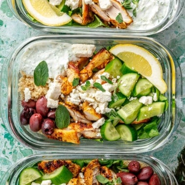 3 chicken gyro bowls in meal prep containers.