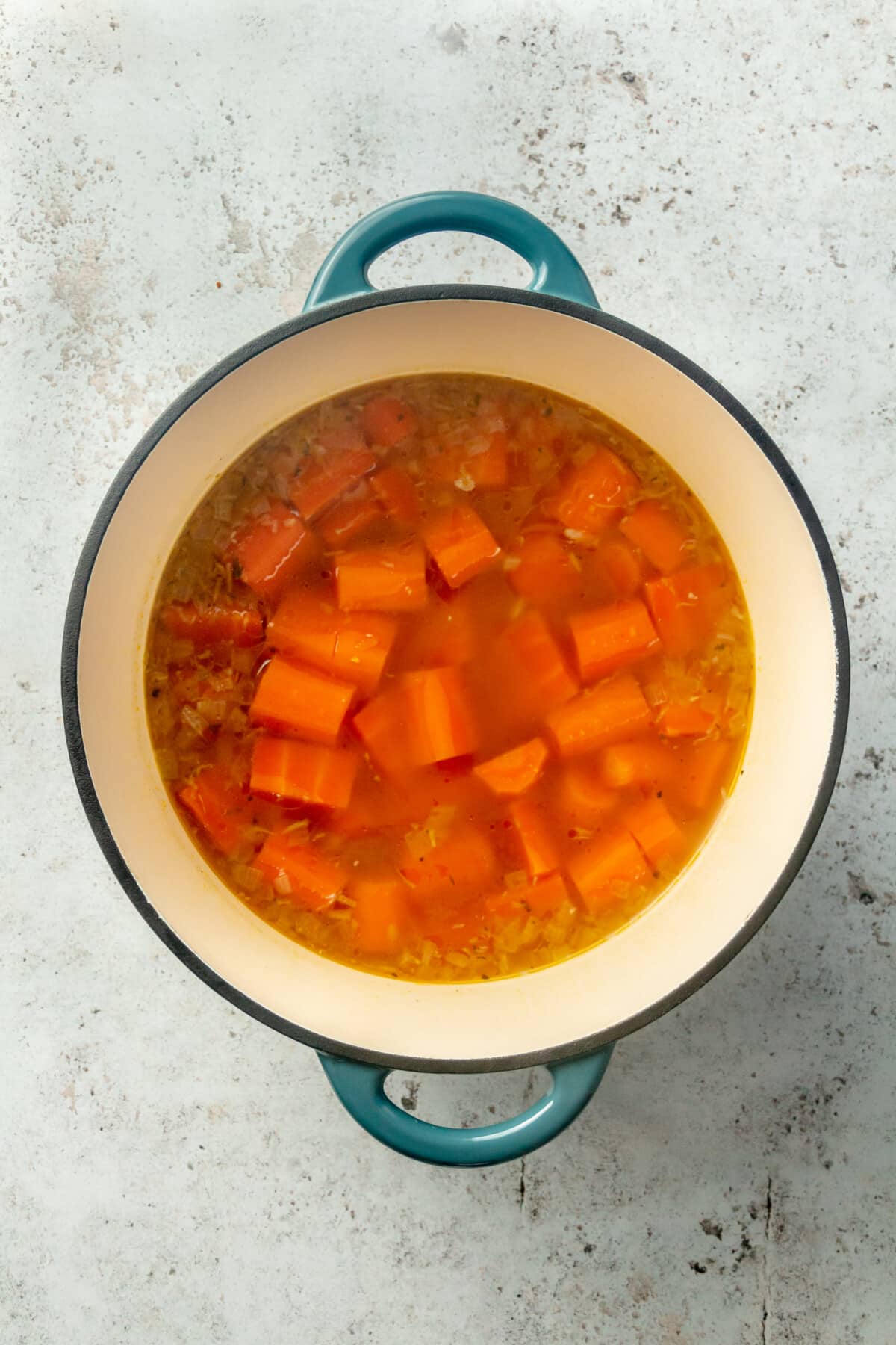 A large pot of carrot soup.
