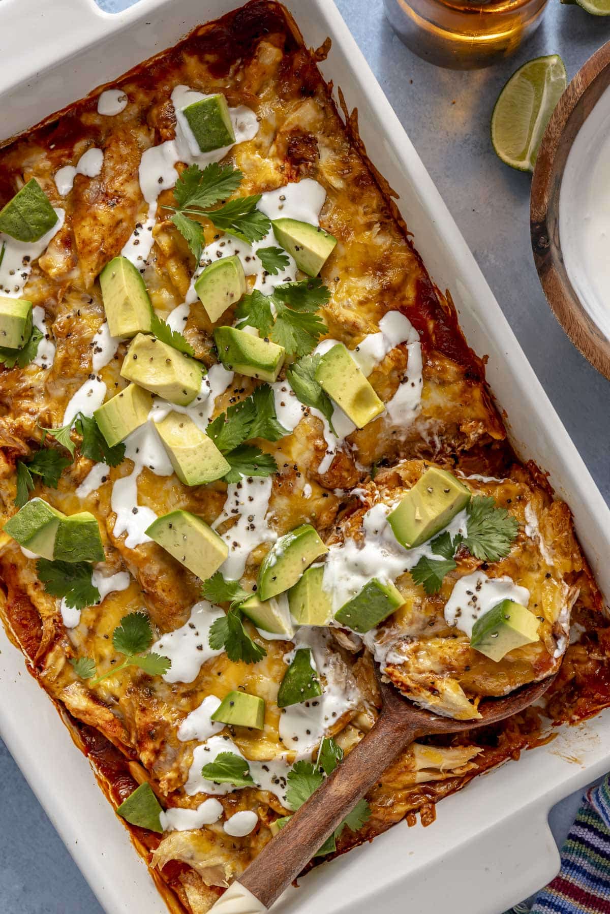 A 9x13-inch casserole dish of chicken enchilada casserole.