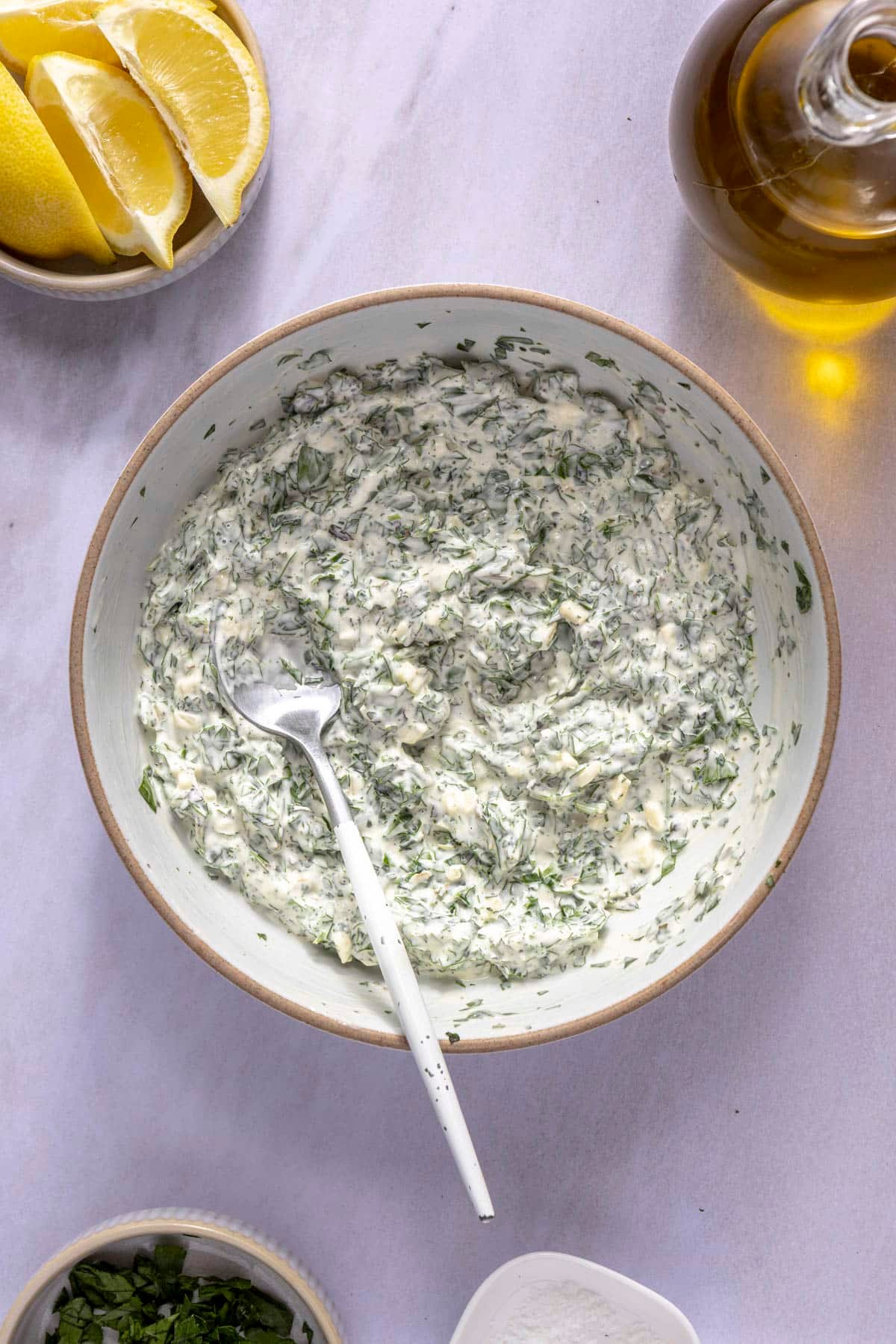 A small bowl of herb mayo.