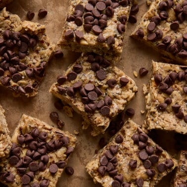 High protein and fiber bars cut into squares on a cutting board.