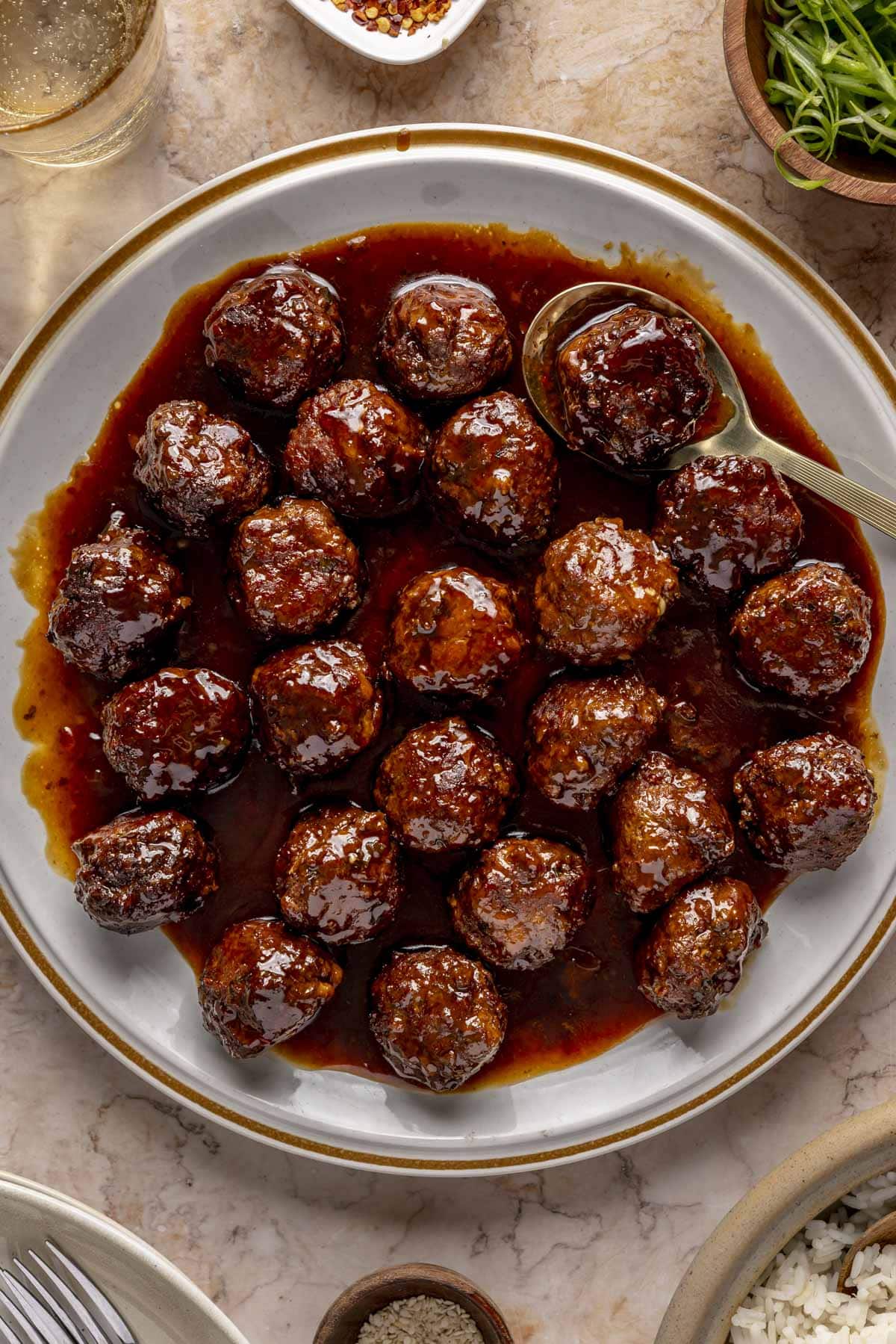 A bowl of turkey teriyaki meatballs.