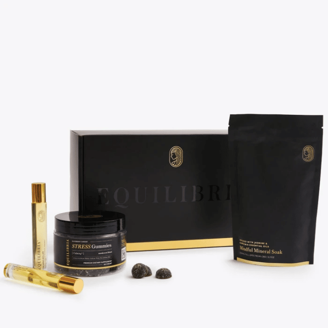Equilibria black packaging of various products against a white background.